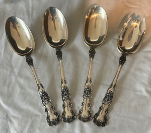 lot 24 image: Four Vintage Gorham Buttercup Sterling Silver Serving Teaspoons