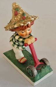 lot 52 image: Rare Trim Lass Hummel Figurine