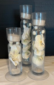 lot 206 image: Trio of Votive Candle Holders with Faux Floral Bases