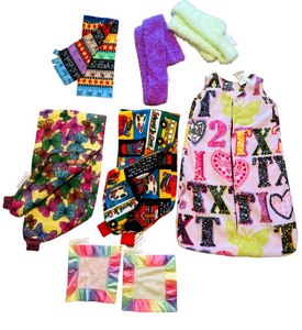lot 177 image: New Cute Handmade Goodies for Toddlers  Babies Including an Adorable Sleep Sack, Shoulder Shrugs and More