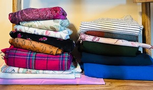 lot 393 image: Pretty Pink Paisley, Plaids, Solids of Fabric Remnants