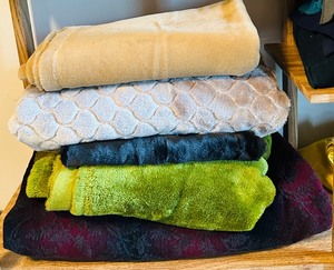 lot 384 image: Large Remnants and Yardage of Faux Fur, Fleece and More