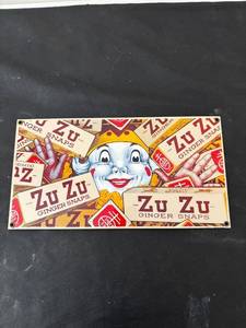 lot 171 image: Vintage Zu Zu Ginger Snaps Advertising Metal Sign