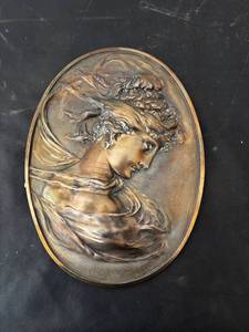 lot 21 image: Art Nouveau Female Bust Metal Plaque with Elegant Relief Design