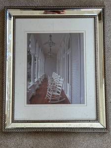 lot 589 image: Framed Print of a Porch with Rocking Chairs