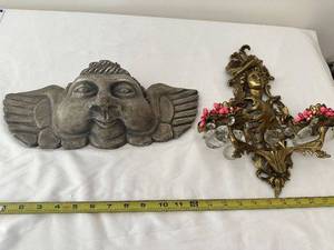 lot 615 image: Set of 2 Decorative Wall Hanging Plaques - Angel Face and Ornate Floral Sconce