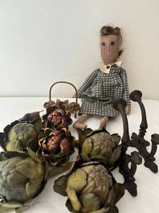 lot 616 image: Rustic Vintage Doll, Faux Artichokes, and Cast Iron Brackets Set