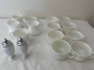 lot 617 image: Set of 14 White Cups and Creamers with Salt and Pepper Shakers