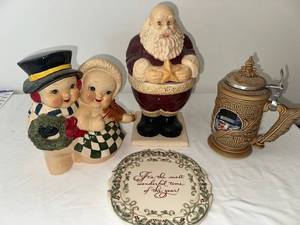 lot 623 image: Christmas Ceramic Collectibles Set with Santa, Carolers, and Stein