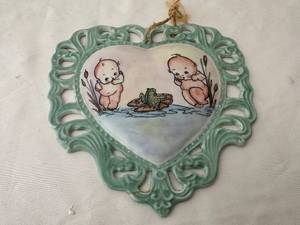 lot 628 image: Handpainted Kewpie Heart Shaped Ceramic Plaque, 2004