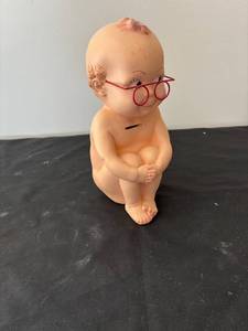 lot 631 image: Vintage Kewpie Baby Coin Bank with Glasses