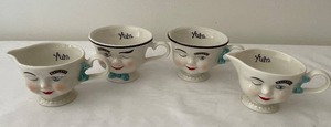 lot 705 image: Set of 4 Baileys Winking Face Mugs and Creamer Set