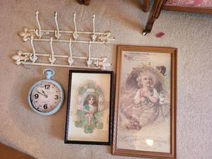 lot 739 image: Vintage Wall Decor Collection Antique Advertisement, Valentine Shadowbox, Posters, Clock, and Coat Rack