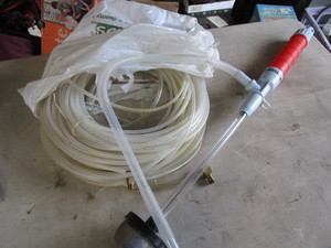 lot 133 image: Bev A Line Hose, Battery Op Pump