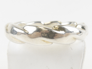 lot 21 image: Twisted Chunky Sterling Silver Bangle.