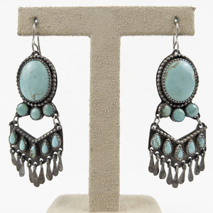 lot 26 image: Heather Hicks (Taos, New Mexico)  1990S Turquoise Tassel Sterling Silver French Wire Dangle Earrings .