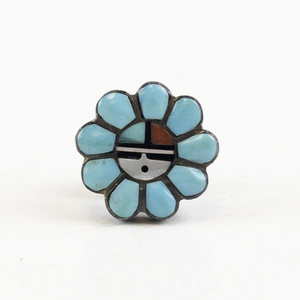 lot 29 image: Zuni Sun Face Flower Sterling Silver Lapel Pin.