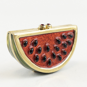 lot 35 image: Estee Lauder  Enamel Watermelon Gold Tone Base Metal Solid Perfume compact .