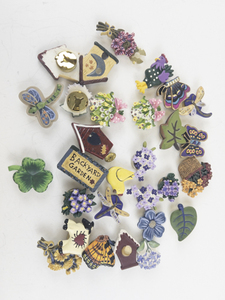 lot 56 image: Group of 25 SummerSpring Time Base Metal Botton Covers.