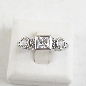 lot 64 image: Judith Ripka Three Stone CZ Sterling Silver Statement Ring . Size 7.75 - 8.