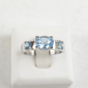 lot 78 image: Sj Blue Topaz Sterling Silver Ring. Size 7.5 - 7.75.