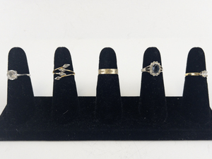 lot 105 image: Group of 5  Gold Tone Base Metal Rings. Size 6.5-7.25.
