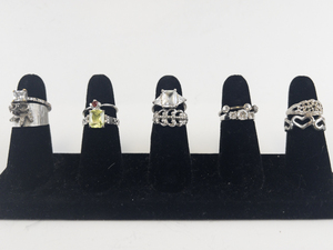 lot 112 image: Group of 10 Silver Tone Base Metal Rings . Size 7.75-8.5.