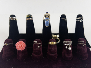 lot 115 image: Group of 16  Gold & Silver Tone Base Metal Rings. Size 4-4.5.