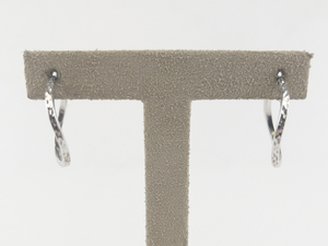 lot 127 image: Twisted & Etched Sterling Silver Hinged Wire Hoop Earrings.