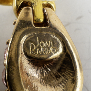 lot 143 image: Joan Rivers Pink Rhinestone Accented Bird Gold Tone Base Metal Stud Earrings .