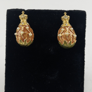 lot 153 image: Joan Rivers Faberge Egg Gold Tone Base Metal Stud Earrings .