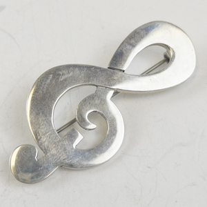 lot 177 image: Mexico Treble Clef Sterling Silver Brooch .