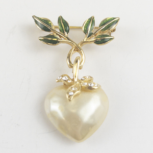 lot 187 image: Joan Rivers Synthetic Pearl & Green Enamel Gold Tone Base Metal Brooch .