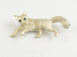 lot 192 image: Running Fox Gold Tone Base Metal Brooch .