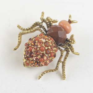 lot 208 image: Joan Rivers Sparkling Spider Gold Tone Base Metal Brooch .