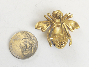 lot 214 image: Blue Rhinestone Bug Gold Tone Base Metal Brooch .