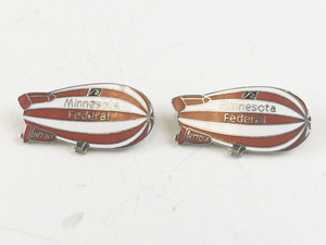 lot 216 image: Two Minnesota Federal Blimps Silver Tone Base Metal Brooch .