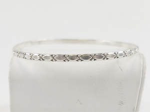 lot 247 image: Embossed Sterling Silver Bangle Bracelet.