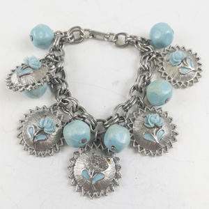 lot 251 image: Turquoise Rose Silver Tone Sterling Silver Charm Bracelet.