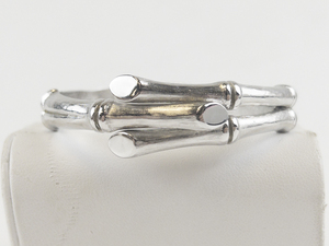 lot 256 image: Trifari  Bamboo Silver Tone Base Metal Hinged Bangle.