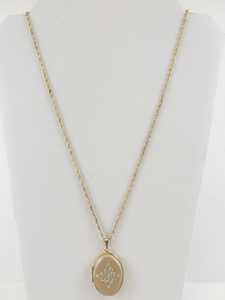 lot 286 image: Gorgeous Pink Enamel Etched Gold Tone Base Metal Locket Necklace.