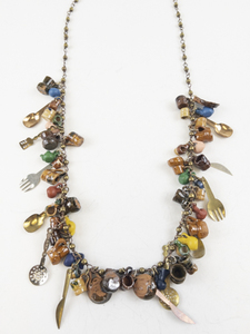lot 304 image: Vintage Mexican Folk Pottery Base Metal Charm Necklace.