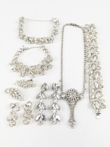 lot 306 image: Group of 7 Rhinestone Silver Tone Base Metal Necklace, Bracelets, & Earrings.