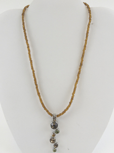 lot 318 image: Lia Sophia  Brown & Green Silver Tone Base Metal Bead Pendant Necklace.