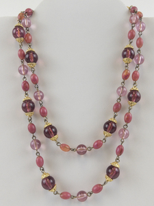 lot 321 image: Worthington Pink Beaded Gold Tone Base Metal Bead Necklace.