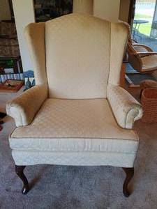 lot 27 image: Cream Upholstered High- Back Chair