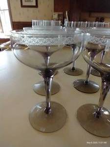 lot 102 image: Twelve Smoked Glasses
