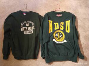 lot 409 image: UND Fighting Sioux & NDSU Sweatshirt