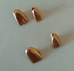 lot 419 image: (4) Unused 22 Carat Gold Tooth CapsCrowns