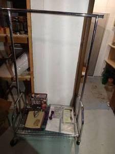 lot 557 image: Clothes Rack, Scale, Dumb bells, Storage Bags